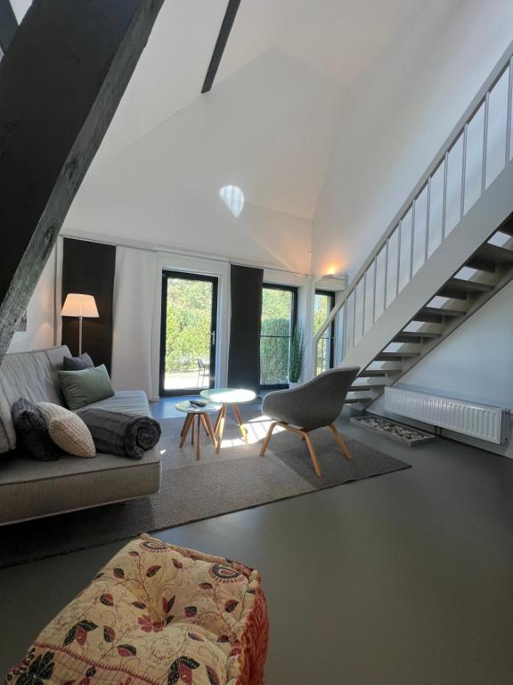 Postel nebo postele na pokoji v ubytování HAUS DOHRMANN - mit direktem Strandzugang,moderne, ruhig gelegene Ferienwohnungen mit Terrasse