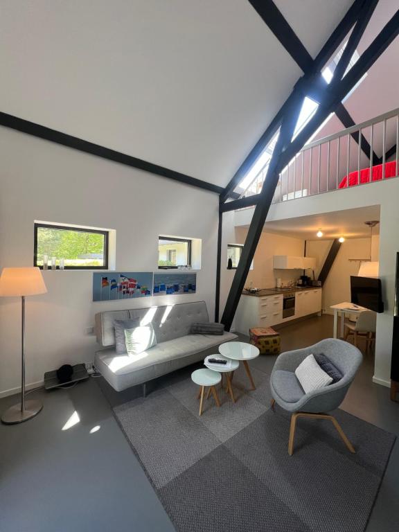 Posezení v ubytování HAUS DOHRMANN - mit direktem Strandzugang,moderne, ruhig gelegene Ferienwohnungen mit Terrasse