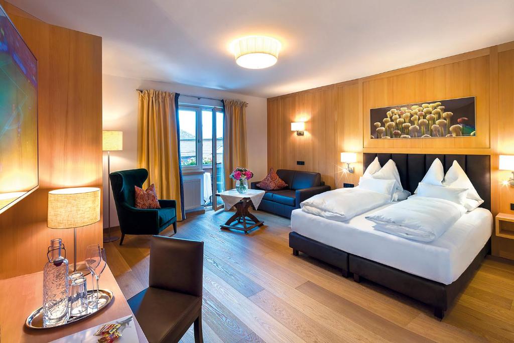 Postel nebo postele na pokoji v ubytování Hotel Zinnkrügl