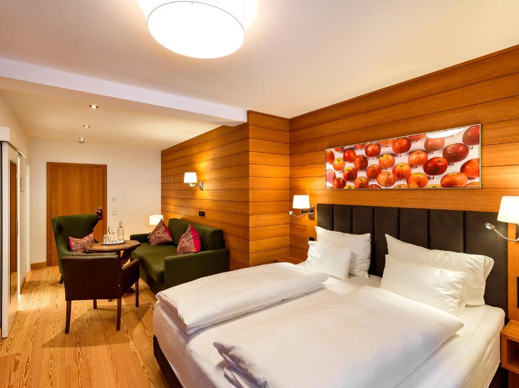 Postel nebo postele na pokoji v ubytování Hotel Zinnkrügl