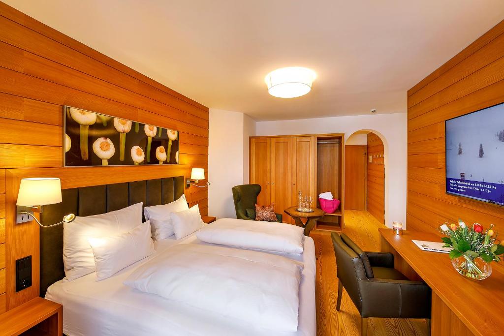 Postel nebo postele na pokoji v ubytování Hotel Zinnkrügl
