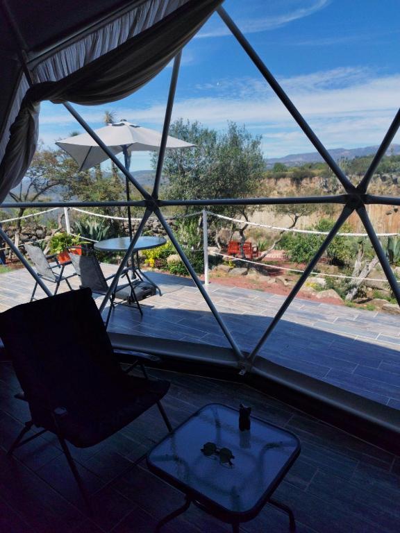 Balkón nebo terasa v ubytování El Gato Glamping con vista a prismas basálticos