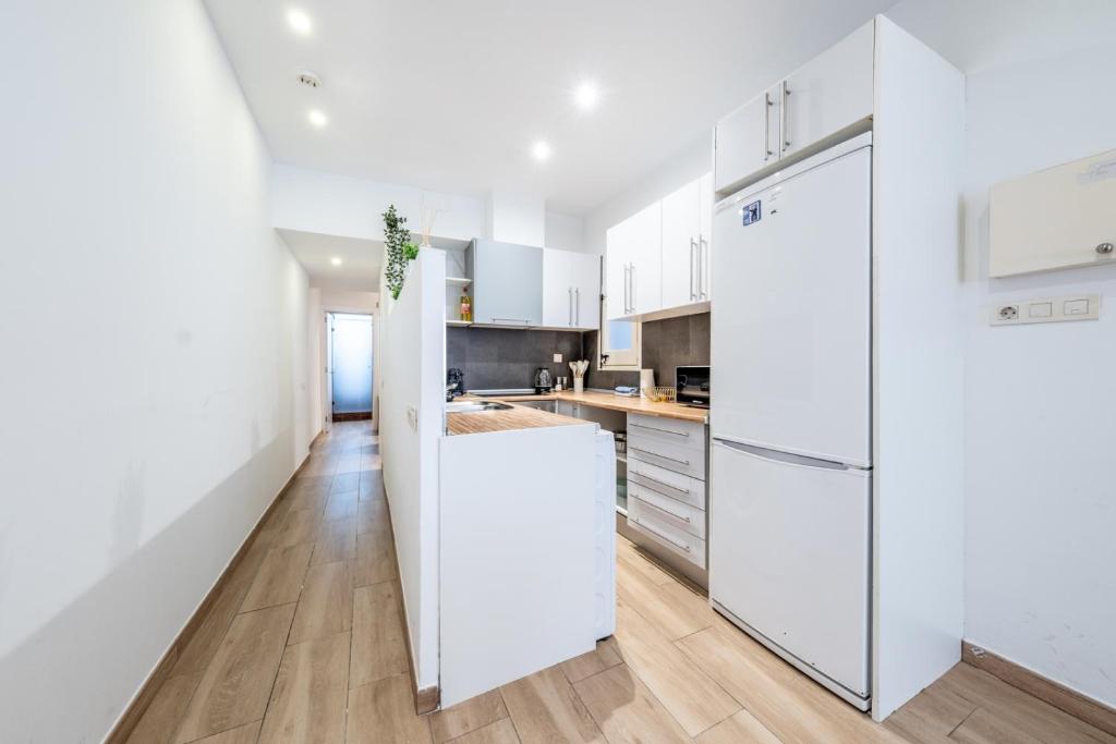 Kuchyňa alebo kuchynka v ubytovaní Caliu Apartments Barcelona - Fira