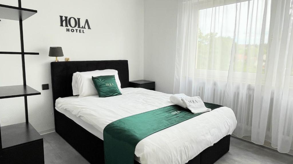Postel nebo postele na pokoji v ubytování Hola Hotel Stuttgart