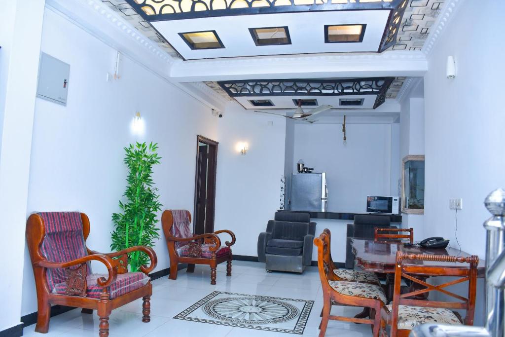 Posezení v ubytování Ez Stay Guesthouse