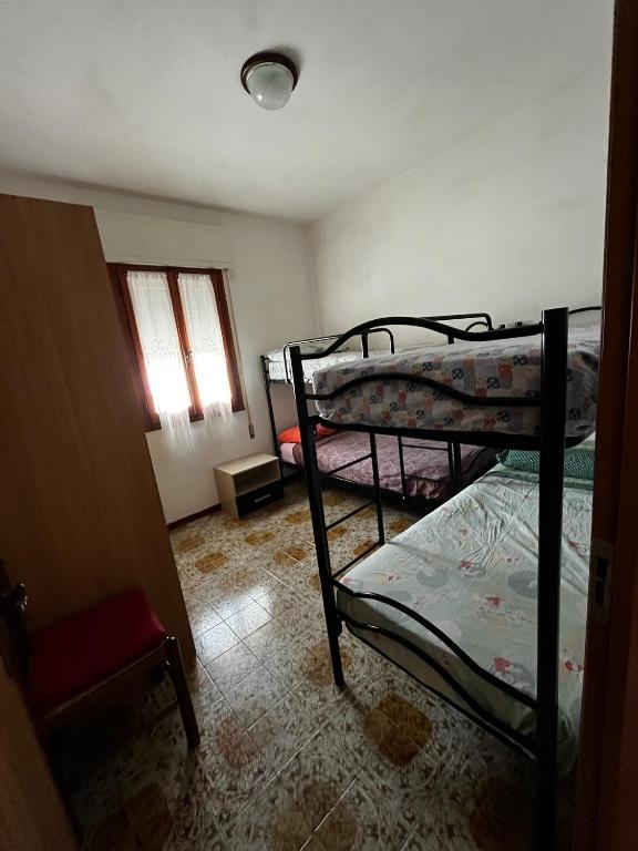 Postel nebo postele na pokoji v ubytování Cristina