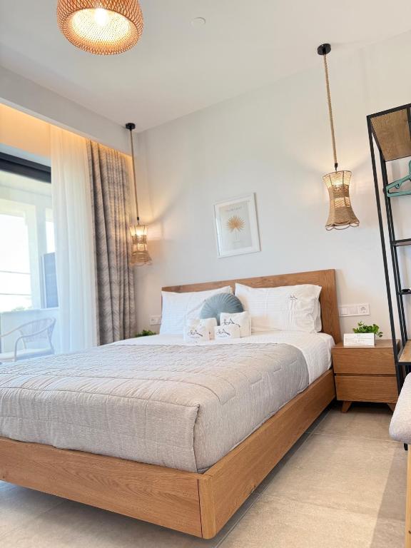 Postel nebo postele na pokoji v ubytování Malka Premium Suites