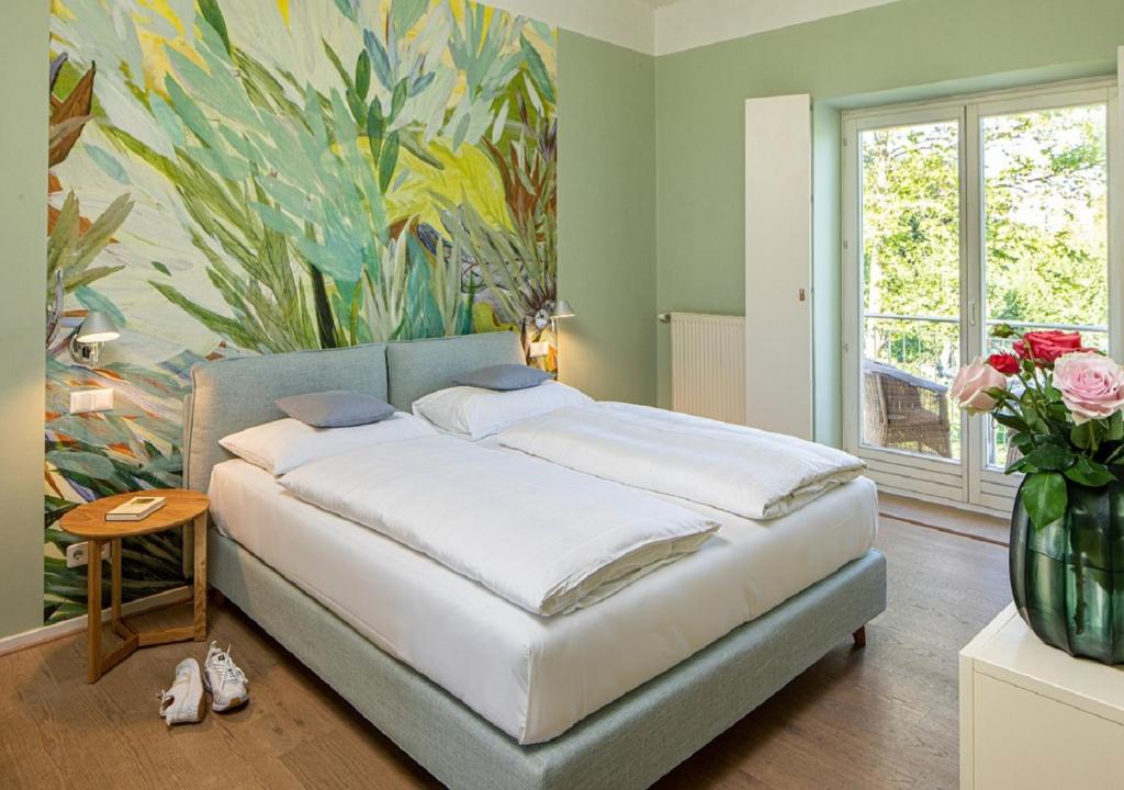 Postel nebo postele na pokoji v ubytování Seehotel Hubertushof