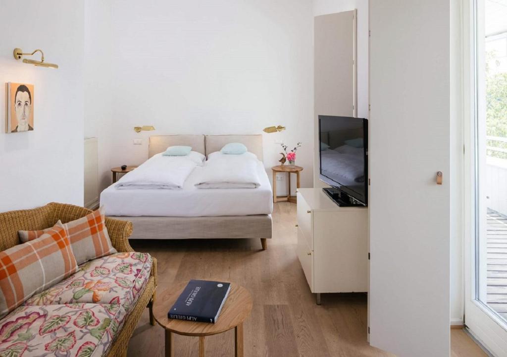 Postel nebo postele na pokoji v ubytování Seehotel Hubertushof