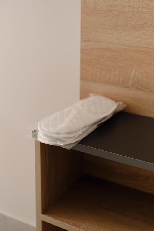 Postel nebo postele na pokoji v ubytování Loft Family Hotel