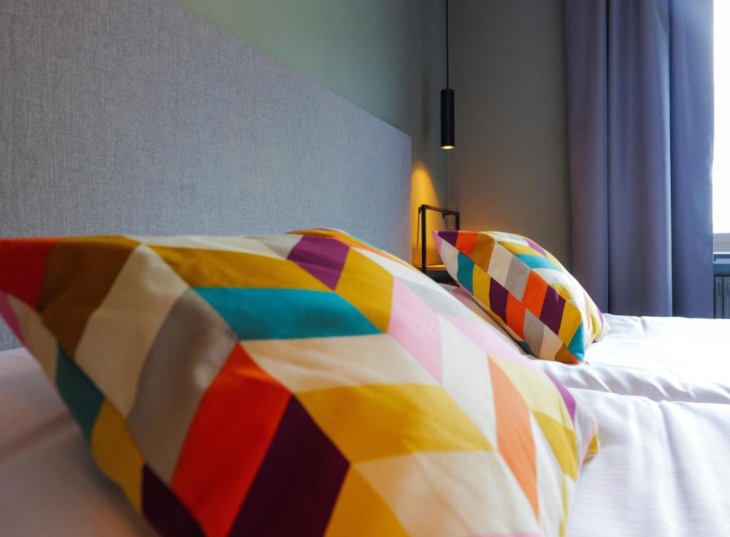 Postel nebo postele na pokoji v ubytování Hotell Veckefjärden