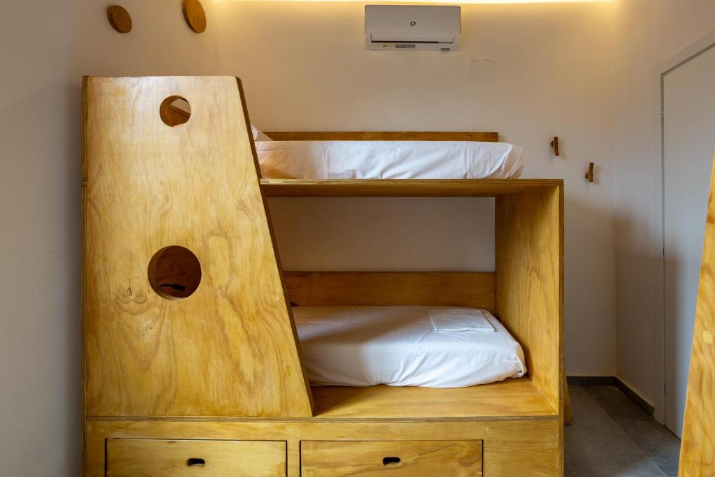 Postel nebo postele na pokoji v ubytování Hotel Paola