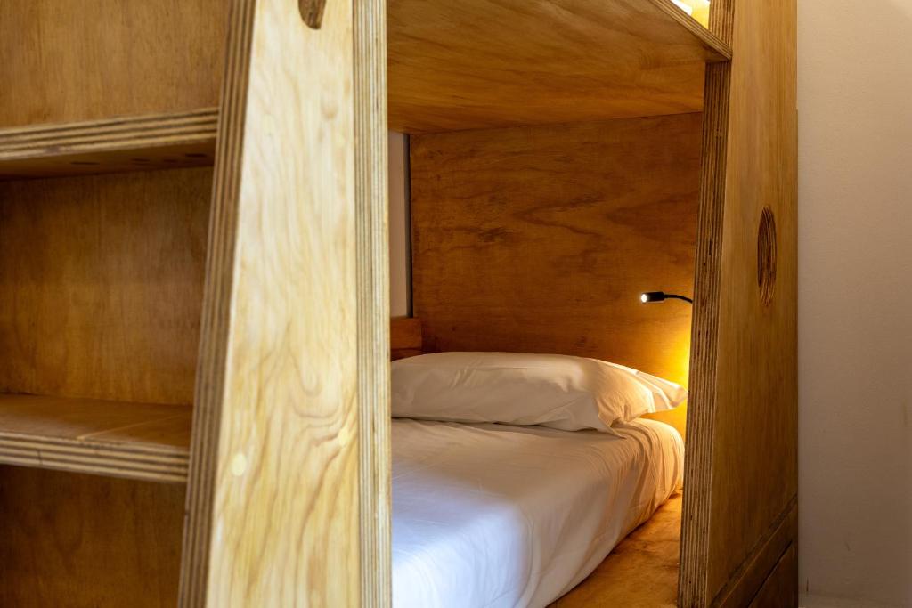 Postel nebo postele na pokoji v ubytování Hotel Paola