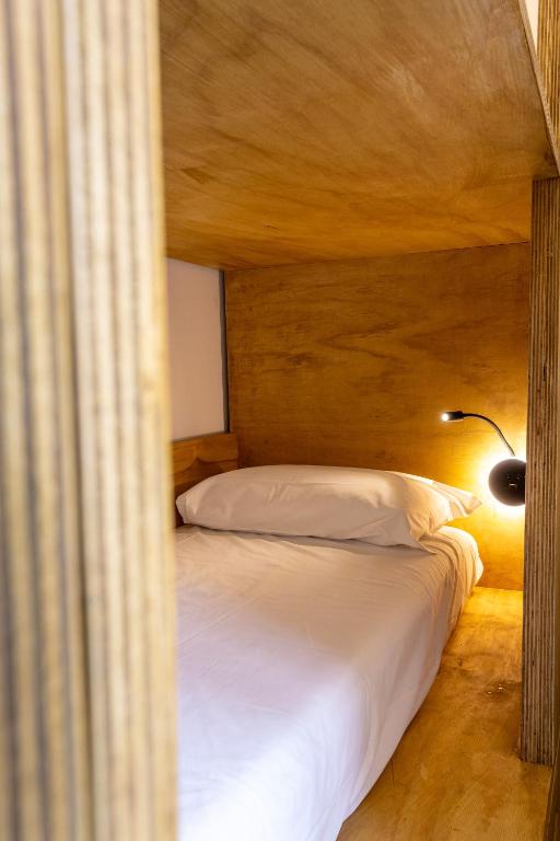 Postel nebo postele na pokoji v ubytování Hotel Paola