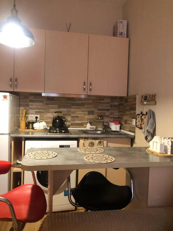 Kuchyň nebo kuchyňský kout v ubytování Tamar's Apartment