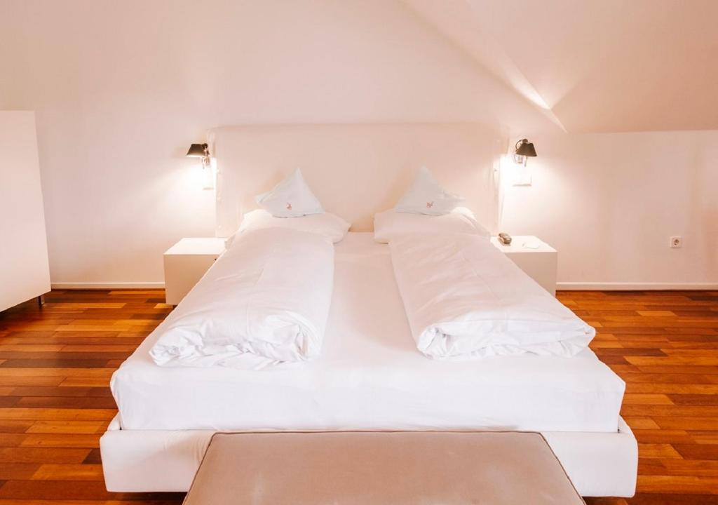 Postel nebo postele na pokoji v ubytování Seehotel Hubertushof