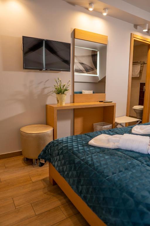 Postel nebo postele na pokoji v ubytování Hotel Epavlis Eleftheriadi