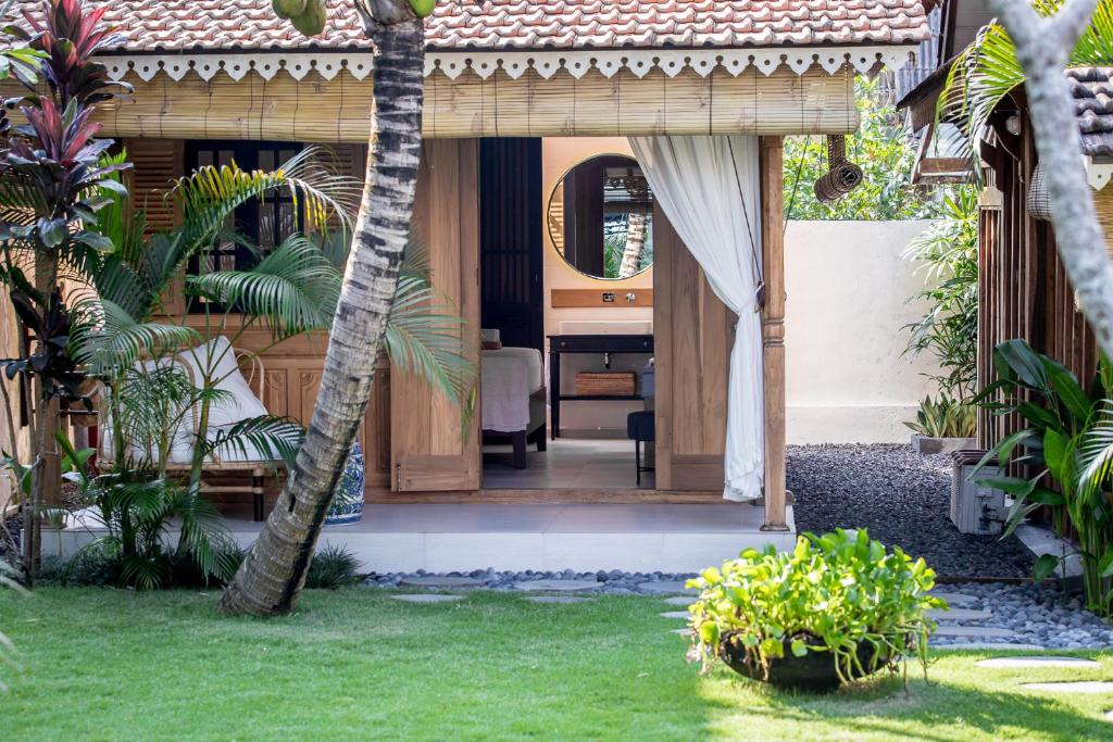 تصویر اتاق‌های Nido Boutique Cottage Canggu - تصویر ۲