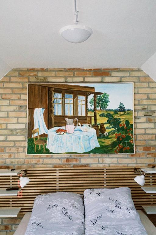 Postel nebo postele na pokoji v ubytování Siedlisko Konradówka