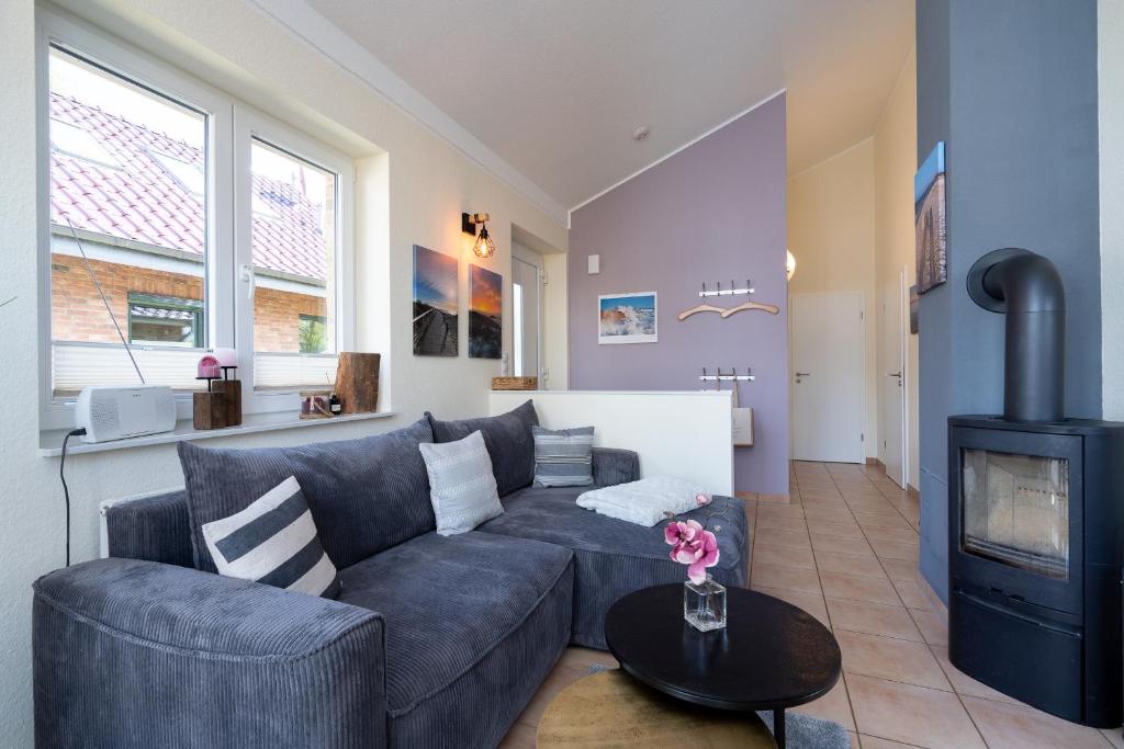 Posezení v ubytování Feriendorf Südstrand Haus 7