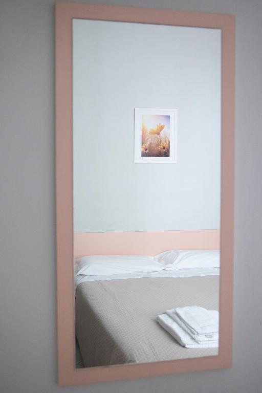 Postel nebo postele na pokoji v ubytování Hotel Laura Beach