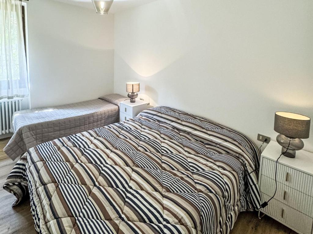 Posteľ alebo postele v izbe v ubytovaní Apartment Dromaè-2 by Interhome
