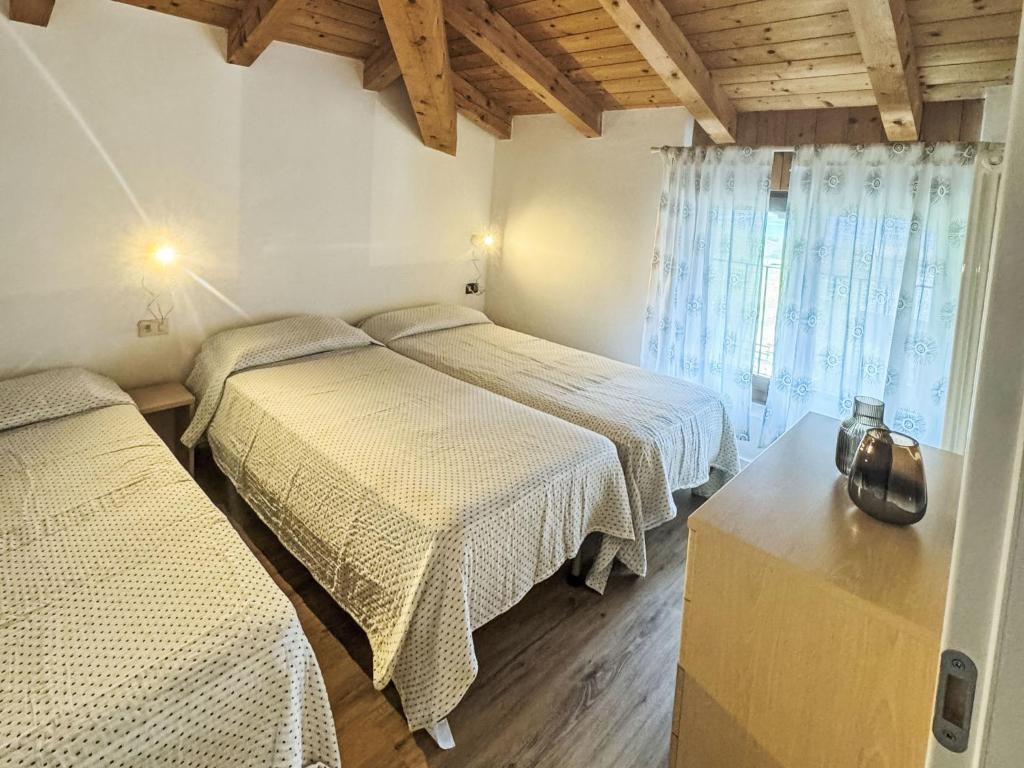 Posteľ alebo postele v izbe v ubytovaní Apartment Dromaè-2 by Interhome
