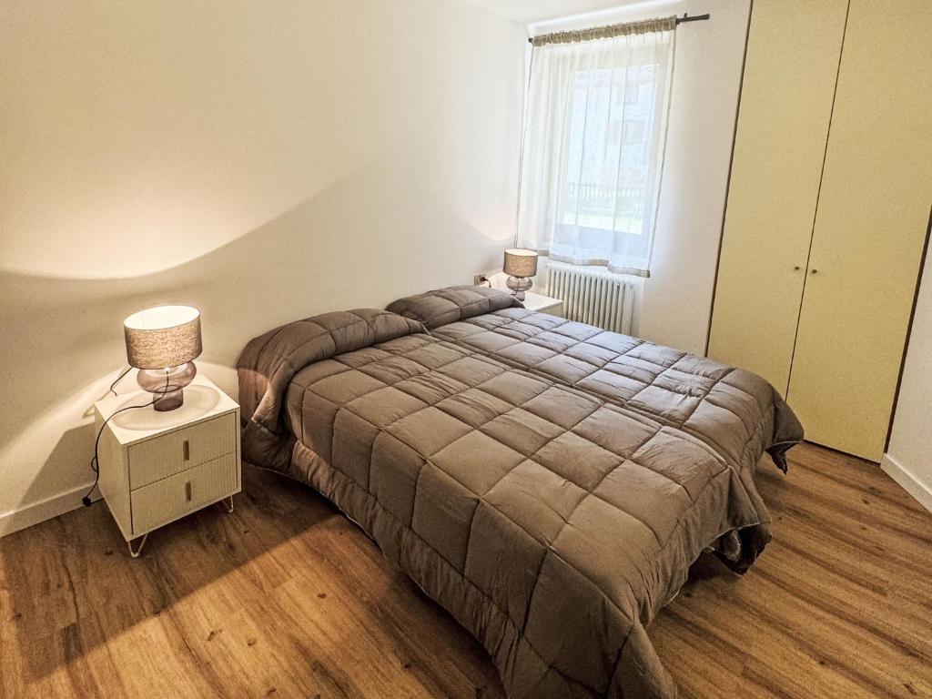 Łóżko lub łóżka w pokoju w obiekcie Apartment Dromaè-1 by Interhome