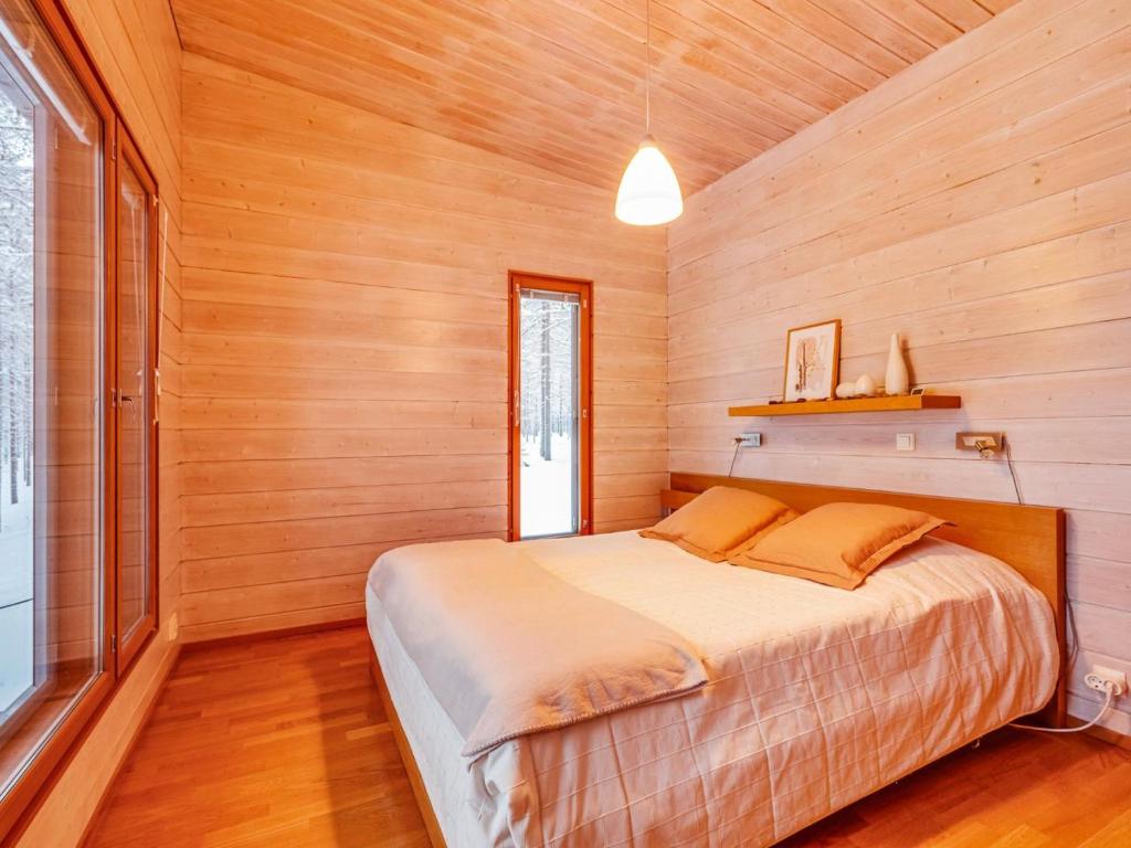 Postel nebo postele na pokoji v ubytování Holiday Home Koukunmaja by Interhome