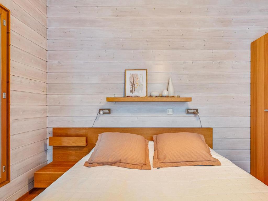 Postel nebo postele na pokoji v ubytování Holiday Home Koukunmaja by Interhome