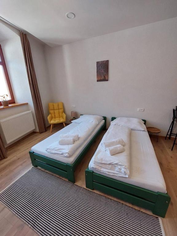 Postel nebo postele na pokoji v ubytování Alipoint Apartments