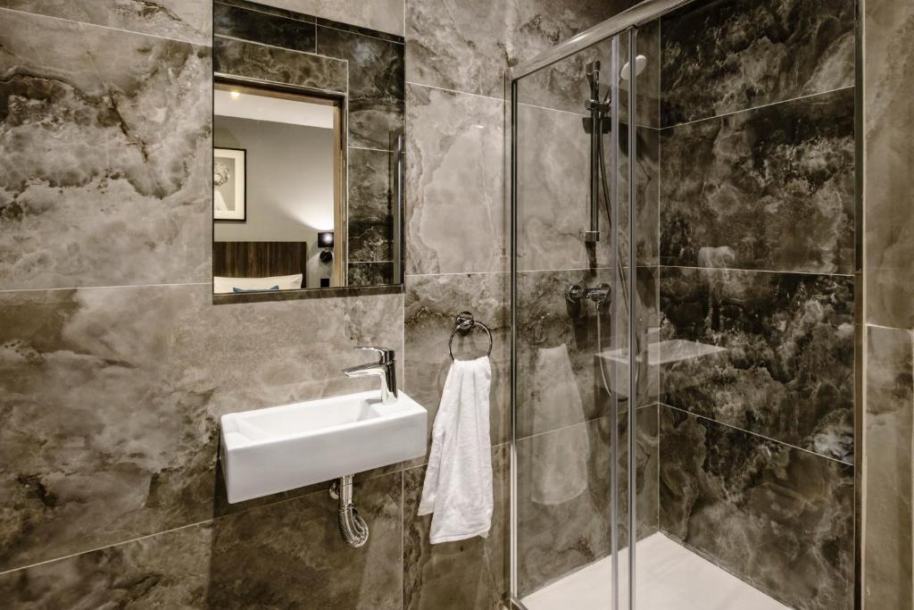 Koupelna v ubytování Spinola Hotel