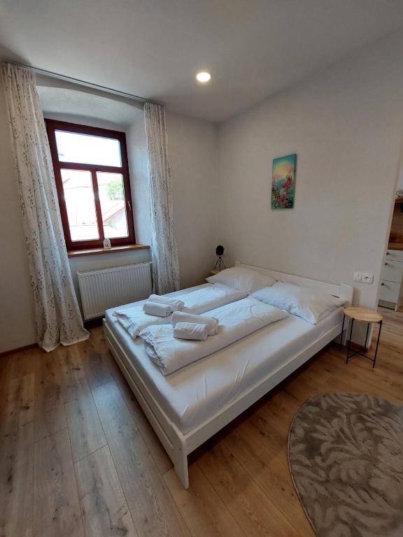 Postel nebo postele na pokoji v ubytování Alipoint Apartments