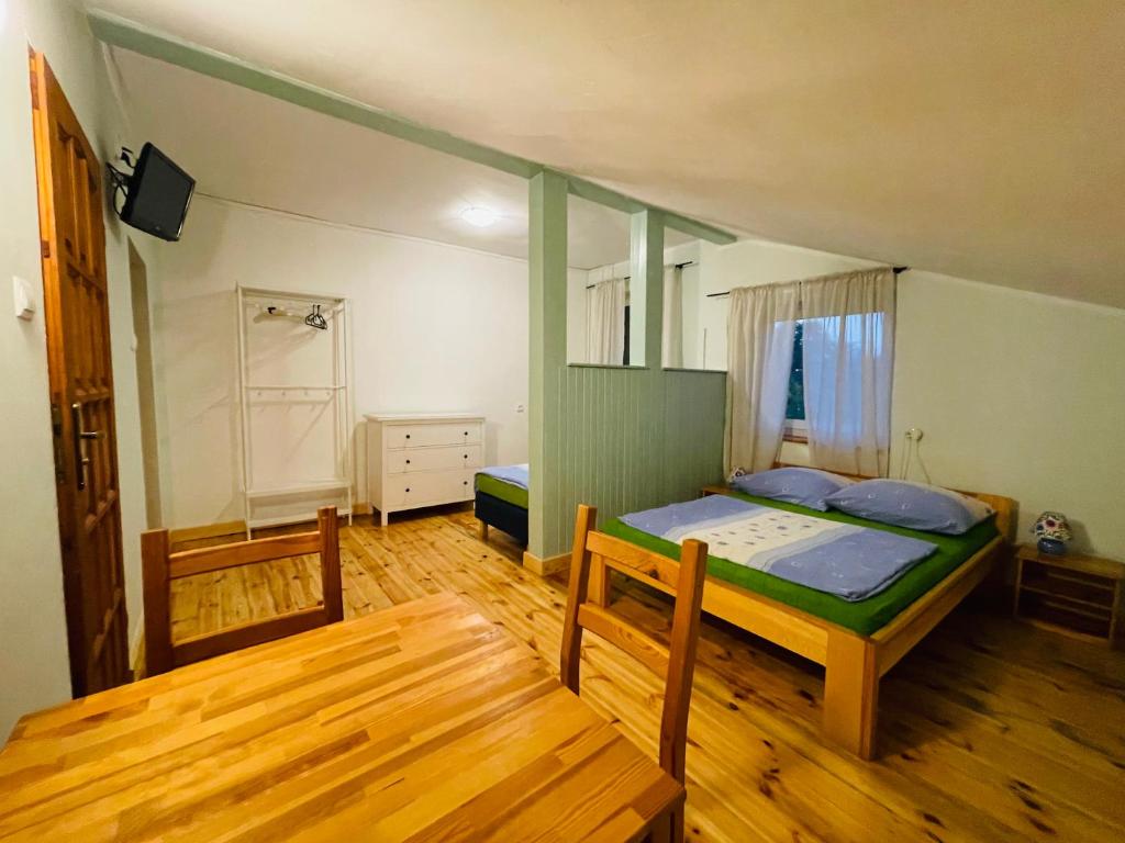 Postel nebo postele na pokoji v ubytování Bros