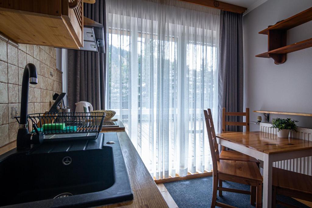 Aparthotel Pod Nosalem - Resim 35