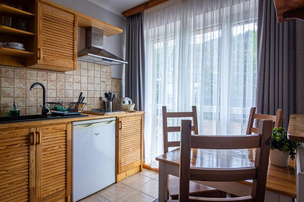 Aparthotel Pod Nosalem - Resim 24