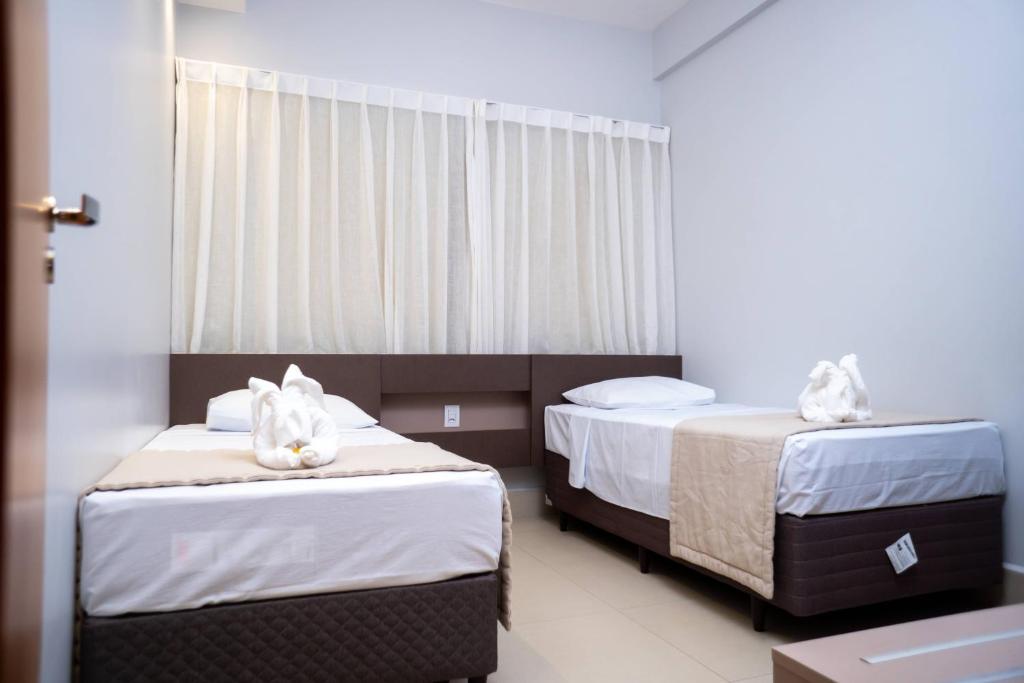 Postel nebo postele na pokoji v ubytování Lagoa EcoTowers Resort - LAGOA OFICIAL