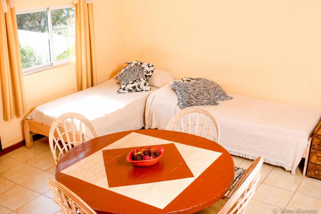 Una cama o camas en una habitación de Soles Blancos Serranita