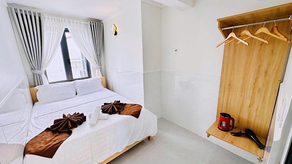 Postel nebo postele na pokoji v ubytování Villa đà lạt Trung Nghĩa 1