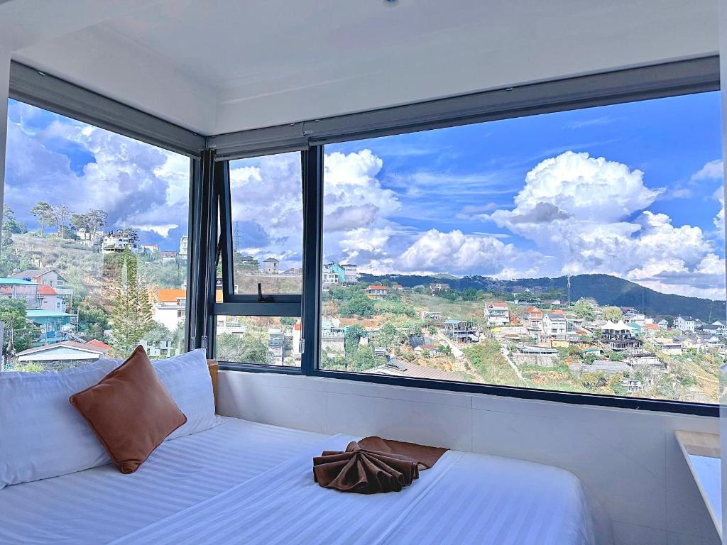 Postel nebo postele na pokoji v ubytování Villa đà lạt Trung Nghĩa 1