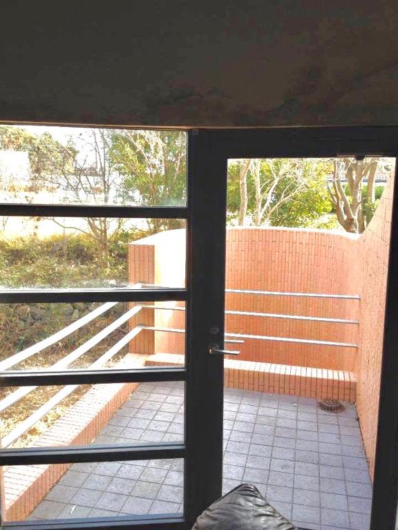 Balkón nebo terasa v ubytování 伊勢志摩 The Guest House 東の窓