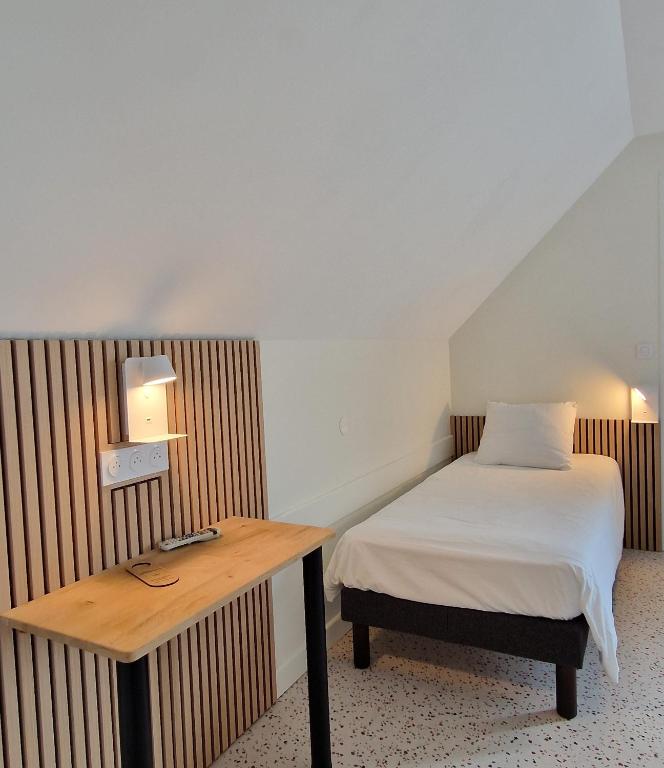 Postel nebo postele na pokoji v ubytování Hotel Eisenhower