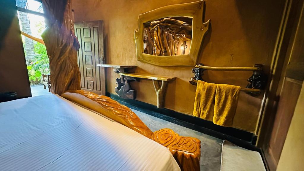 Postel nebo postele na pokoji v ubytování Ama Eco Lodge