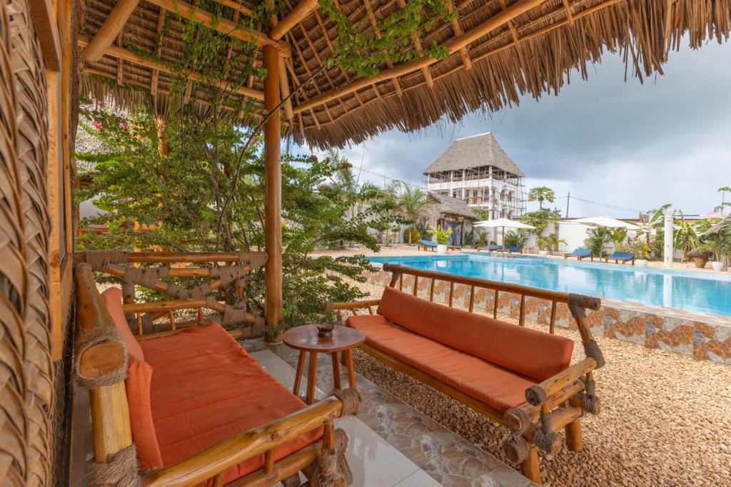Bazén v ubytování Diacarisma Boutique Resort Nungwi nebo v jeho okolí