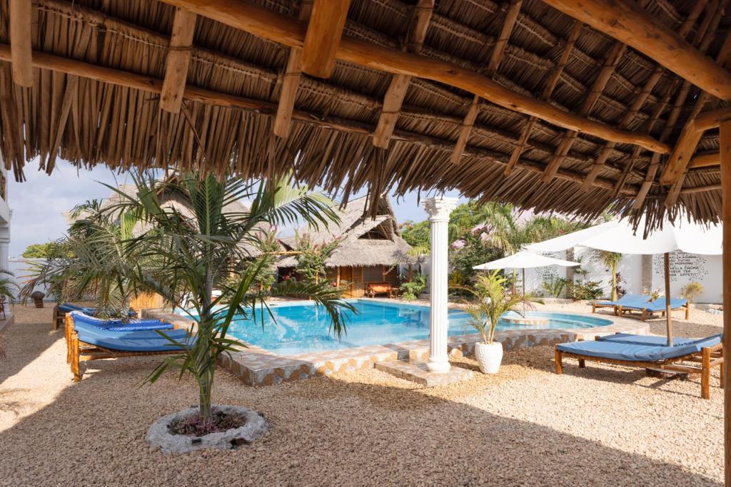 Bazén v ubytování Diacarisma Boutique Resort Nungwi nebo v jeho okolí