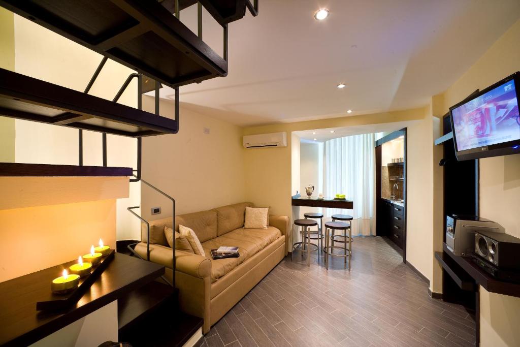 A television and/or entertainment centre at Magi House Relais