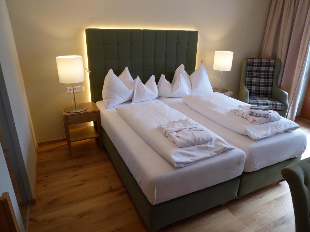 Letto o letti in una camera di Hotel Teichwirt
