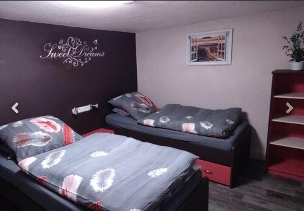 Ένα ή περισσότερα κρεβάτια σε δωμάτιο στο Souterrain