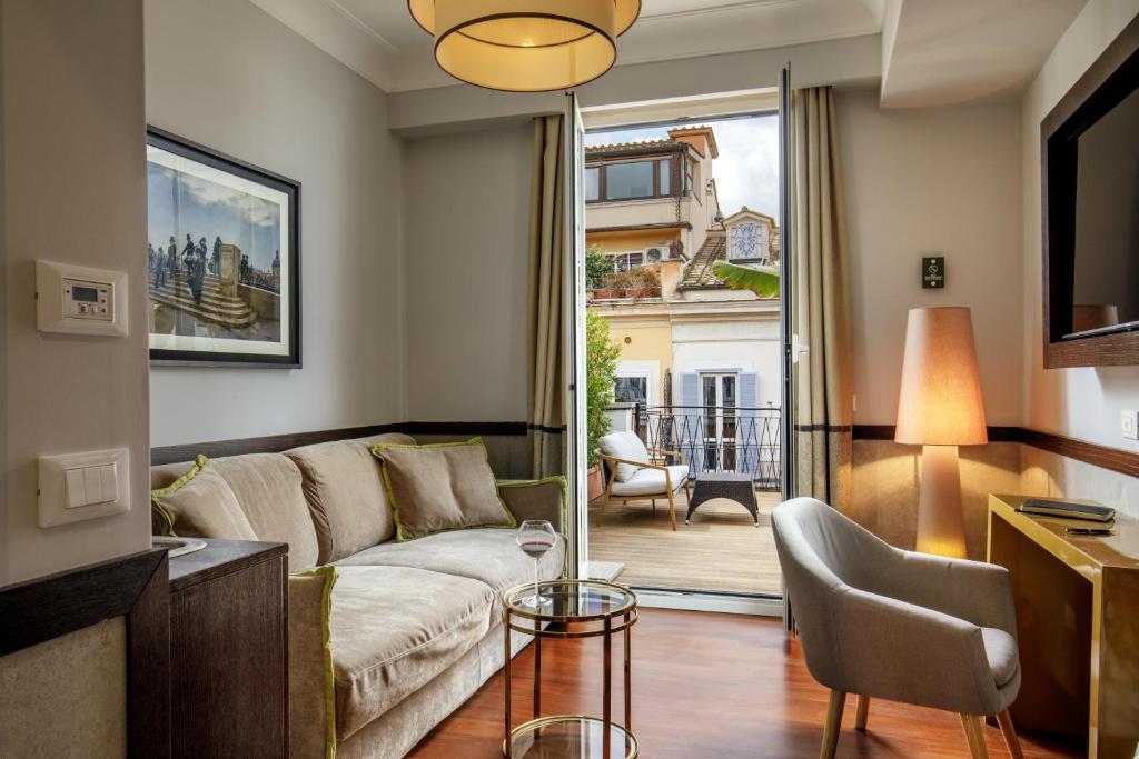 Khu vực ghế ngồi tại Relais Luxury Corso