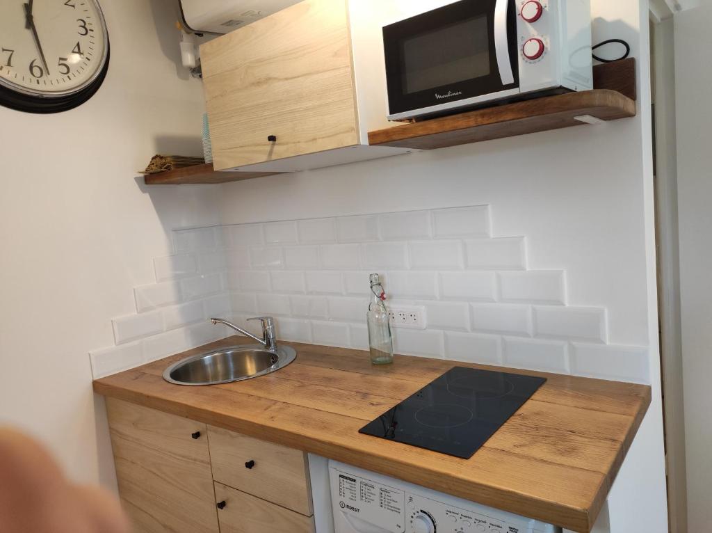 Nhà bếp/bếp nhỏ tại Gite du Verger